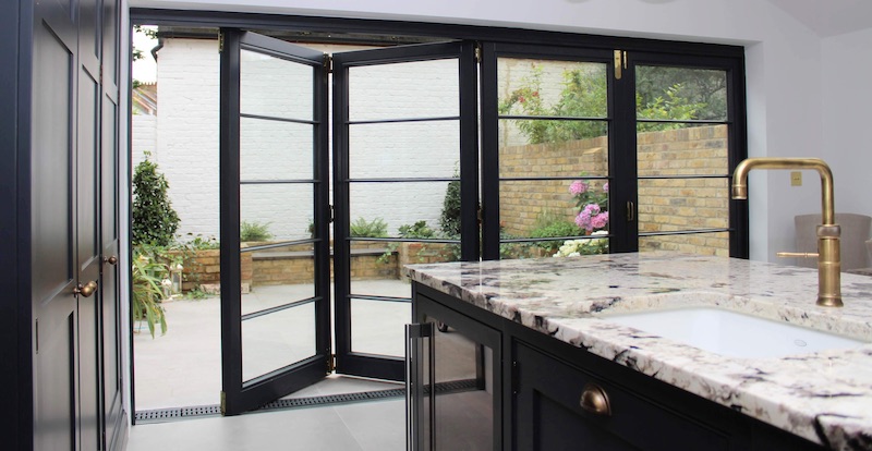 Crittall style timber Bi-folding doors with four doors in Clapham