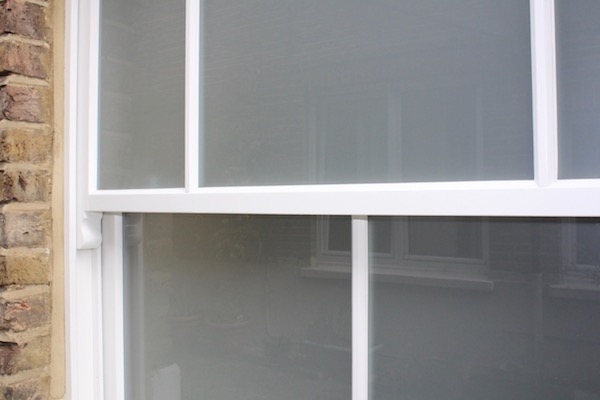 Frosted glass in a timber sash window