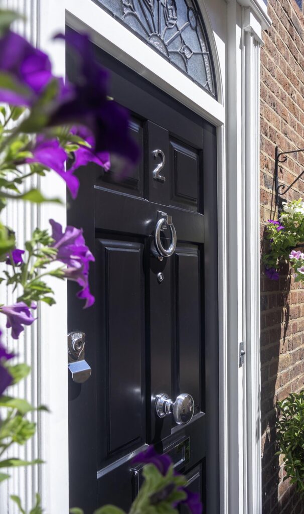A black front door in London