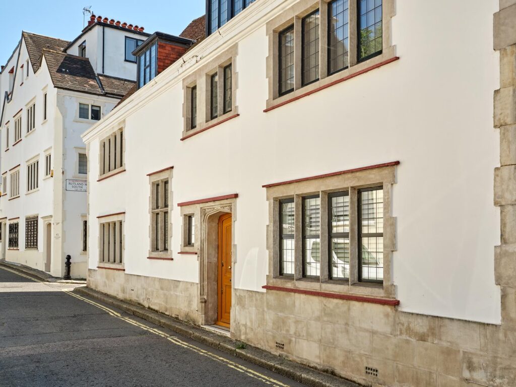 A picture of a house with windows restored by Sashed