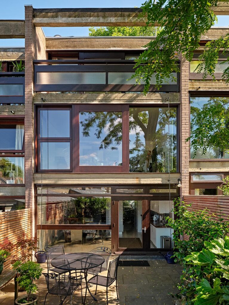 A bespoke timber sliding door in a 1970s house