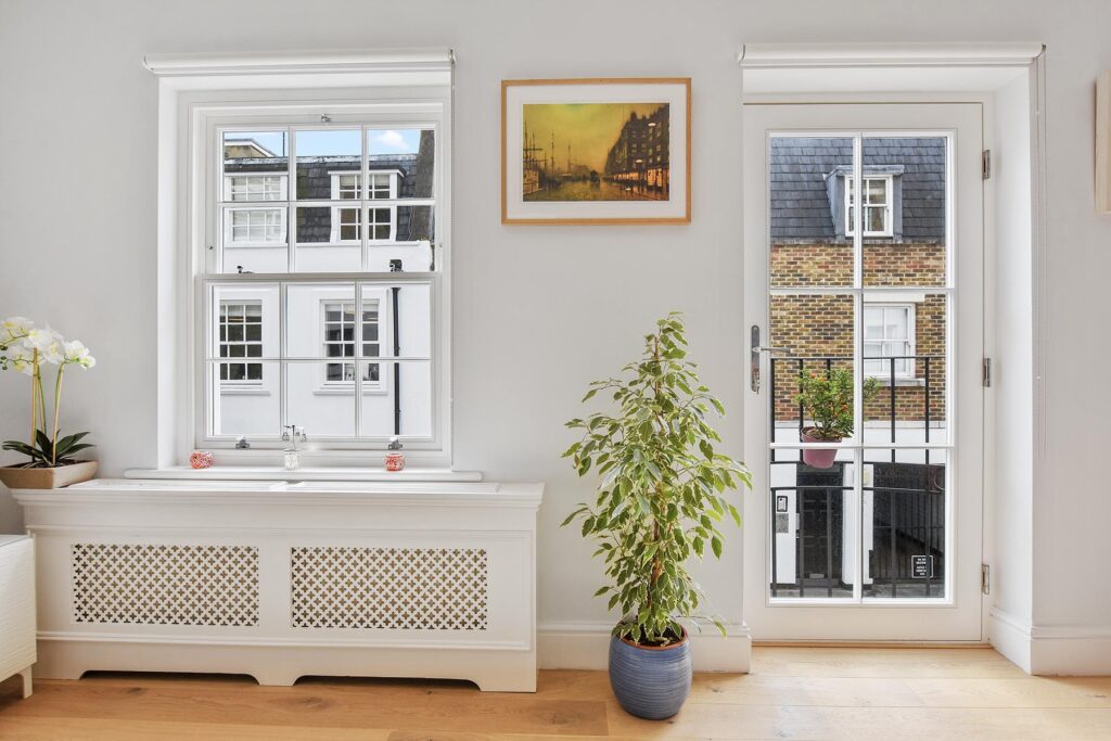 A timber entrance door and a timber window in Paddington