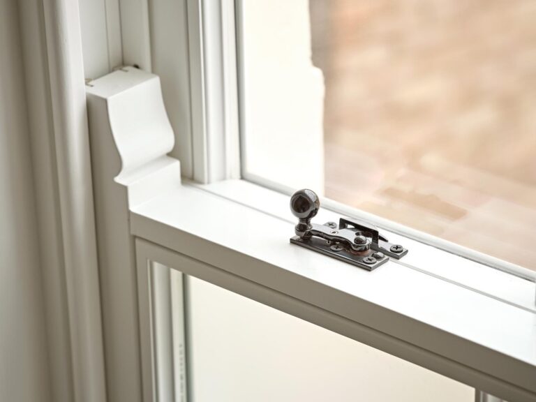 A polished bronze fastener