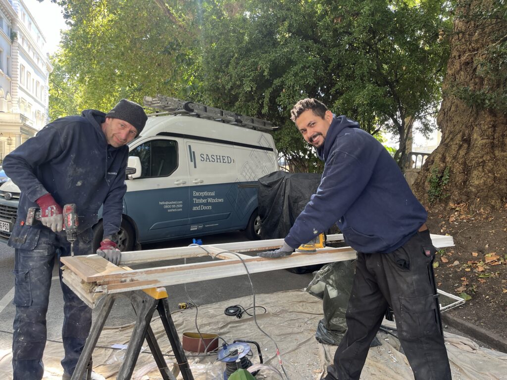 The Sashed renovations team restoring an historic window in Westminster, London.