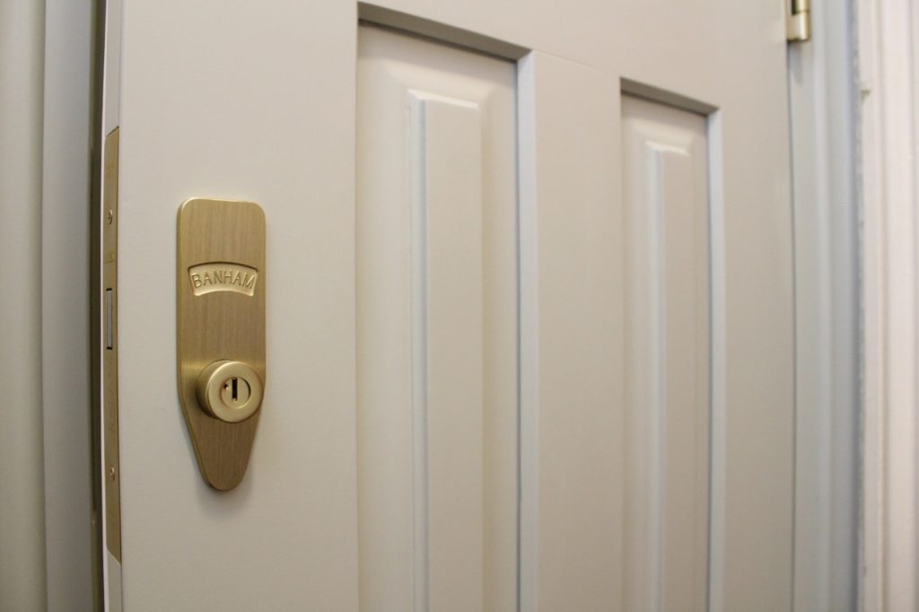 front door detail with Banham safety lock