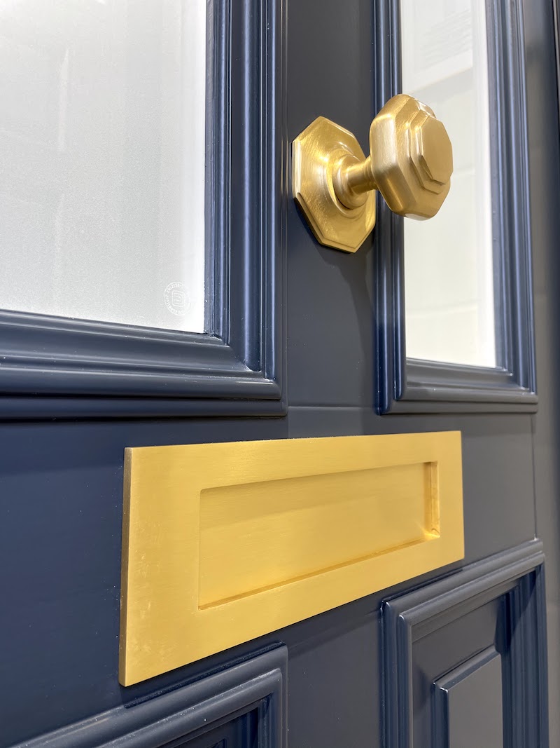 Sashed LTD showroom showing a front door painted in Farrow and Ball Railings no.31