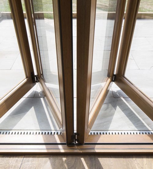 Opening corner timber door