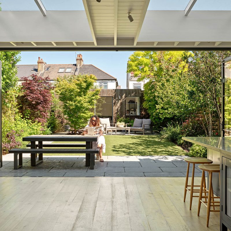 Large timber bifold doors which are open