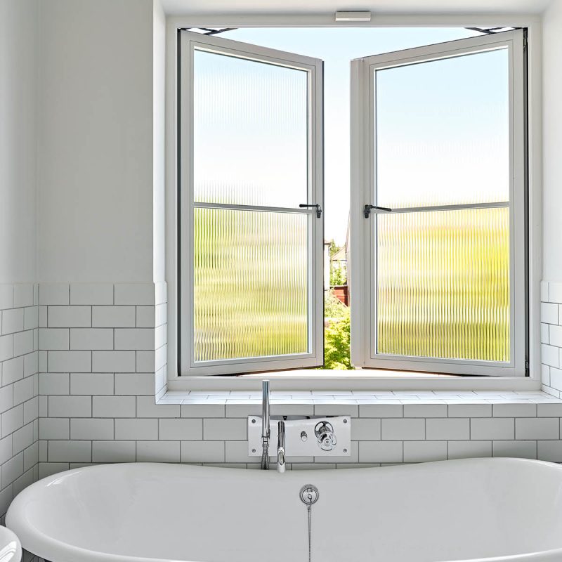 a casement window with reeded glass
