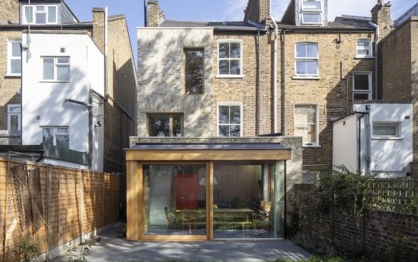 House of timber windows and doors with a sliding patio door and timber sash windows