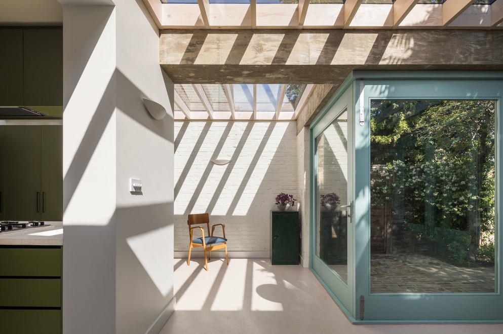 Large timber Pivot doors at rear showing inside and outside view