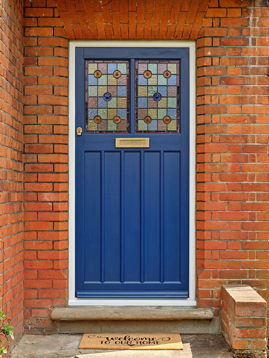 Wooden front door with Celtic design satin glass