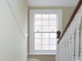 wooden sash window seen from a staircase
